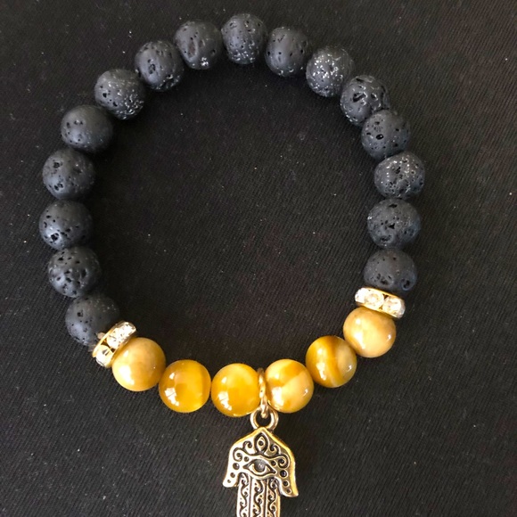 Hamsa hand charm on lava stone beads bracelet with brownish beads or stones. - Picture 2 of 2
